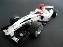 1:43 Minichamps Bar Honda 6 2004 White W/Red Stripes. Uploaded by indexqwest